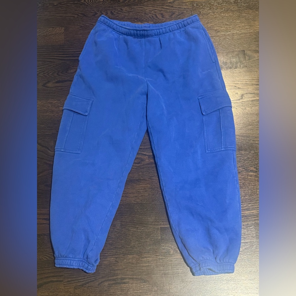 Aritzia worn blue sweatpants cuffed in a size large ( rubs generous)